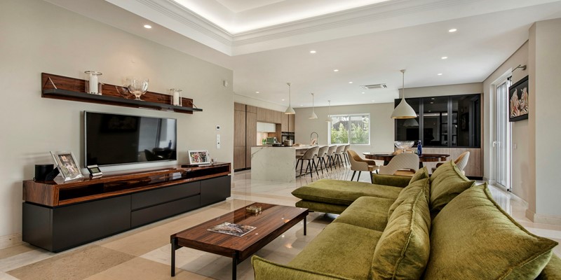 Stylish Open Plan Lounge Dining And Kitchen Area In Luxury Villa