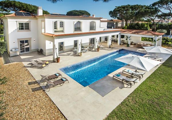 Villa In Portugal Featuring A Sparkling Swimming Pool