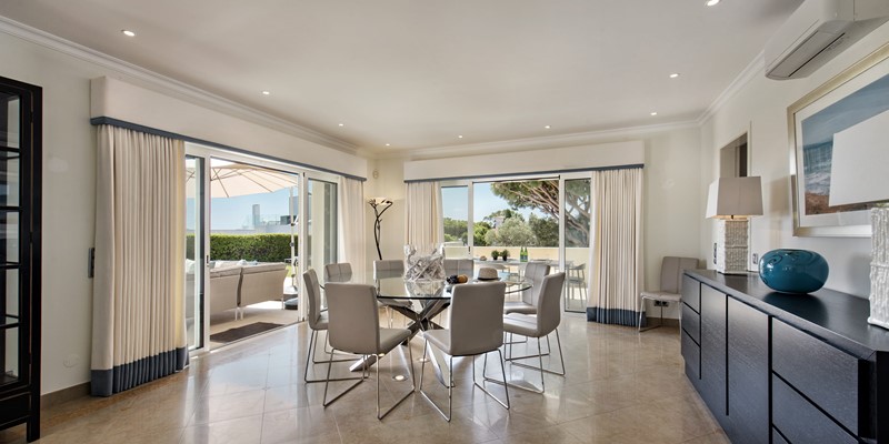 Indoor Dining Space Adjacent To Lounge And Outdoor Terrace