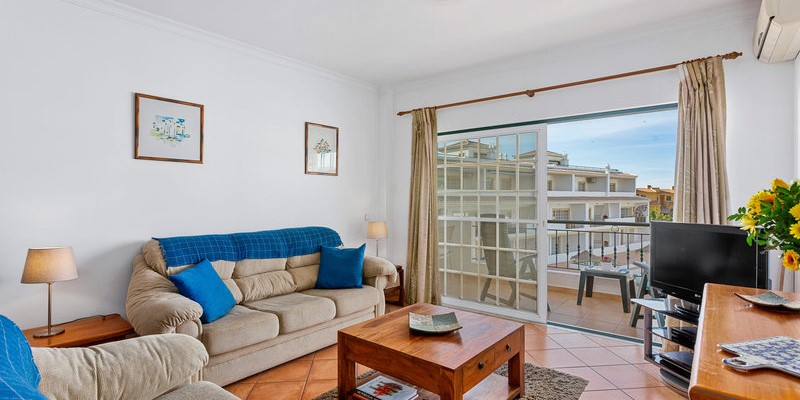 Comfortable Apartment Living Room With English Tv