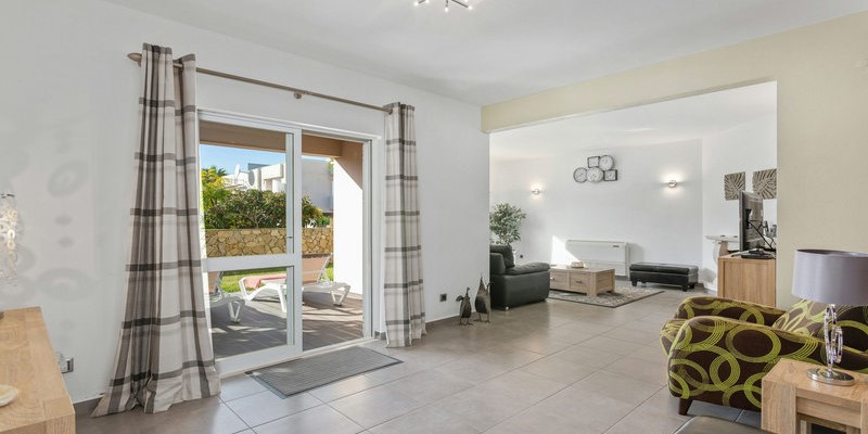 Villa Vilamoura Living Room With Patio Doors Leading To Pool