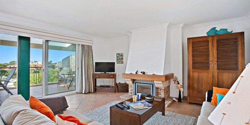 Living Area With Garden View In Algarve Rental Apartment