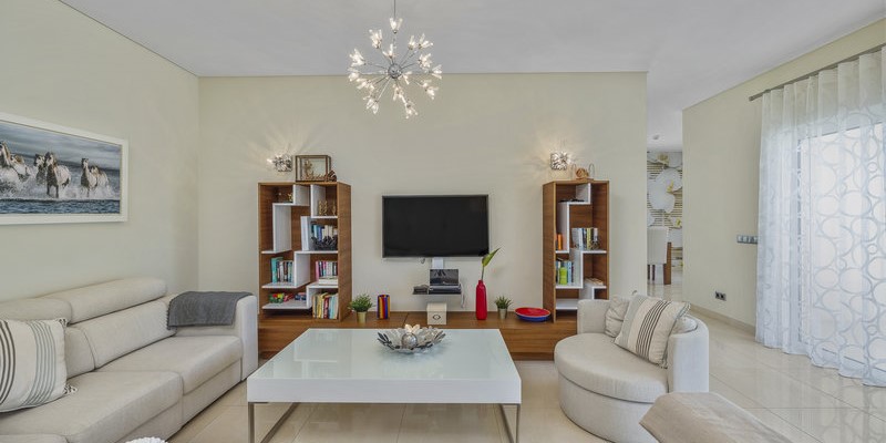 Holiday Villa Spacious Living Room With Patio Doors And Pool Views