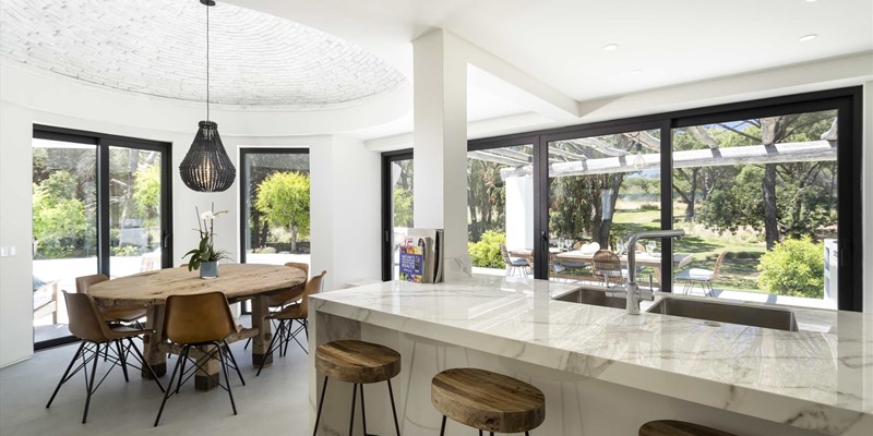 Open Plan Kitchen And Dining Area In Quinta Do Lago