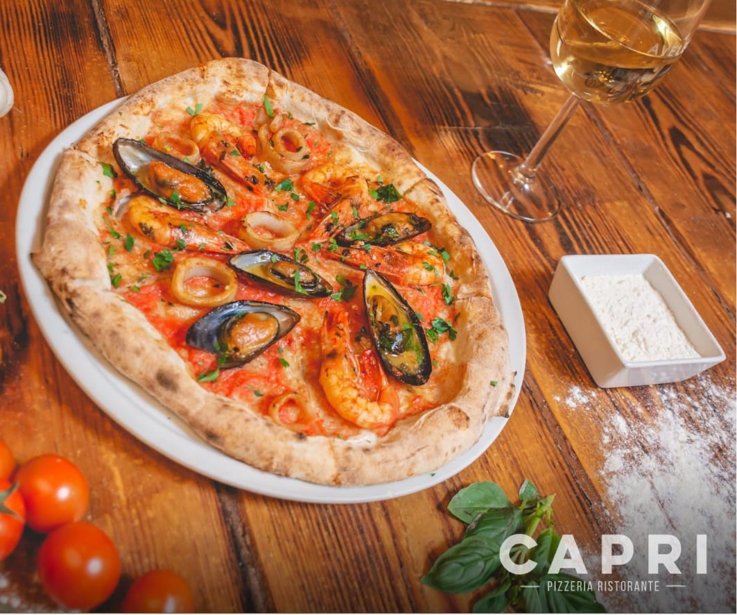 Traditional Pizza In Pizzeria Ristorante Capri